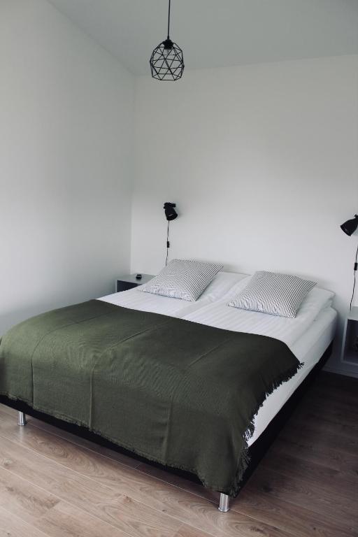 Postel nebo postele na pokoji v ubytování iStay Cottages