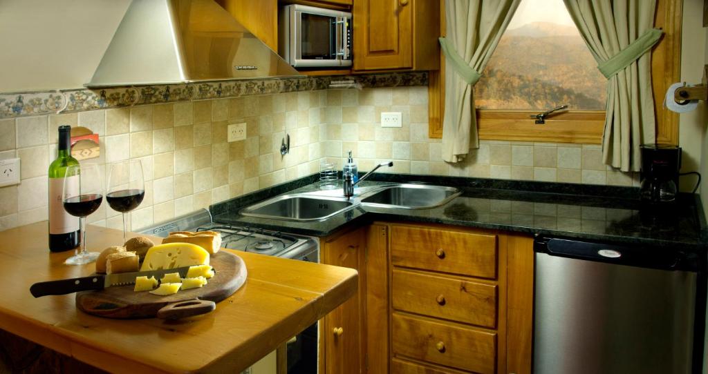 A cozinha ou cozinha compacta de Bungalows Buena Vista