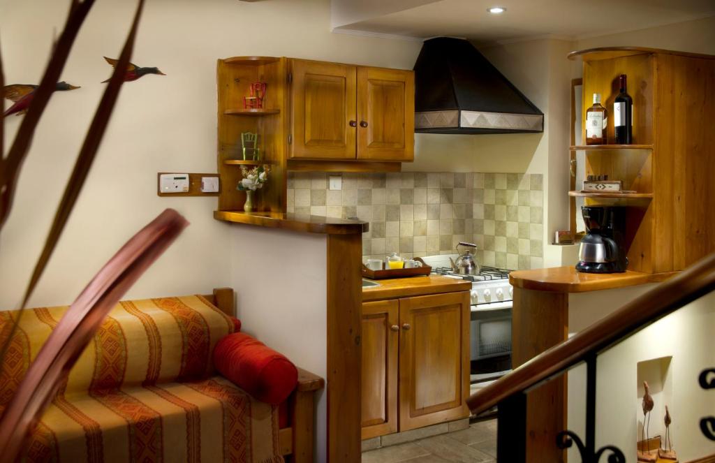 A cozinha ou cozinha compacta de Bungalows Buena Vista