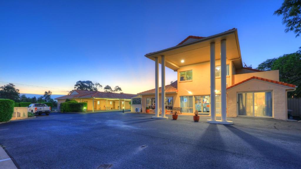 a large building with a view of a city at Country Roads Motor Inn in Goondiwindi