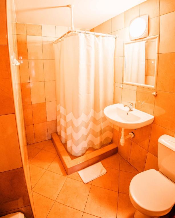 Kúpeľňa v ubytovaní Dom wypoczynkowy Stoch Mądry