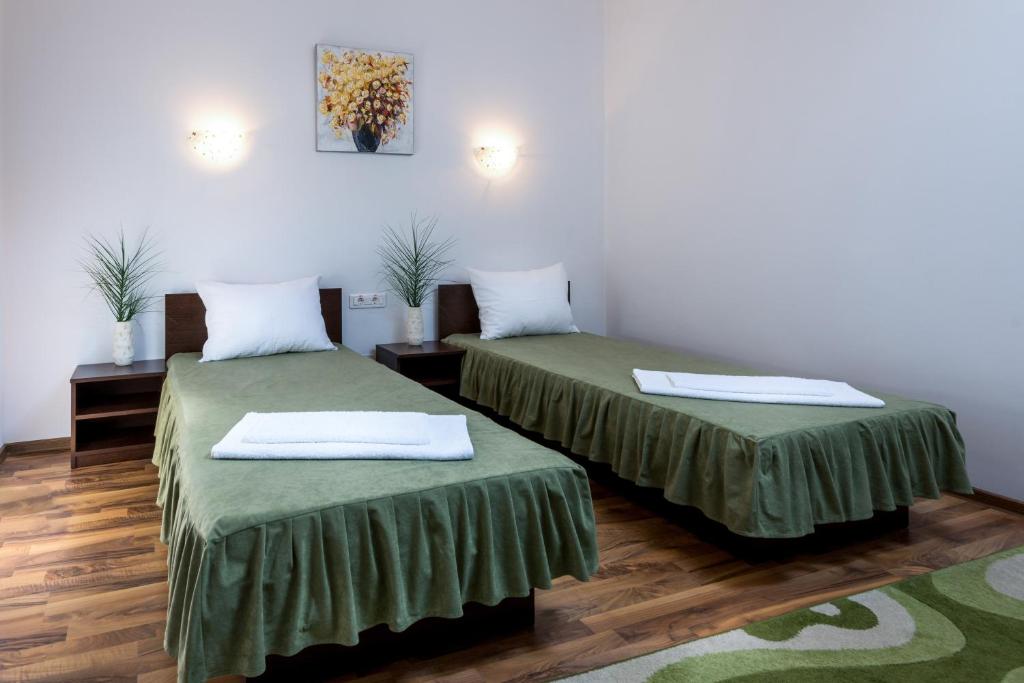 Letto o letti in una camera di Pensiunea Zbor