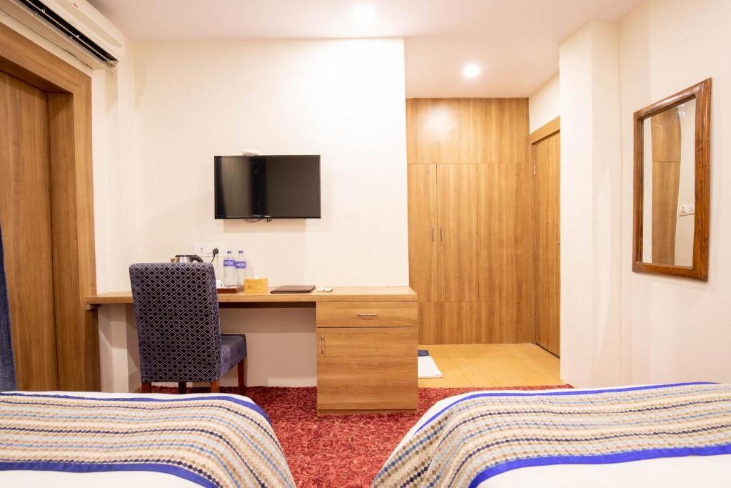 TV a/nebo společenská místnost v ubytování Hotel Siddhartha, Nepalgunj
