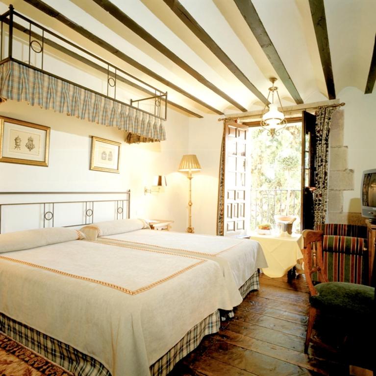 Cama o camas de una habitación en Parador de Santillana Gil Blas
