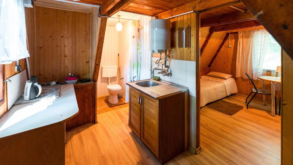 Posteľ alebo postele v izbe v ubytovaní Nova Mazury