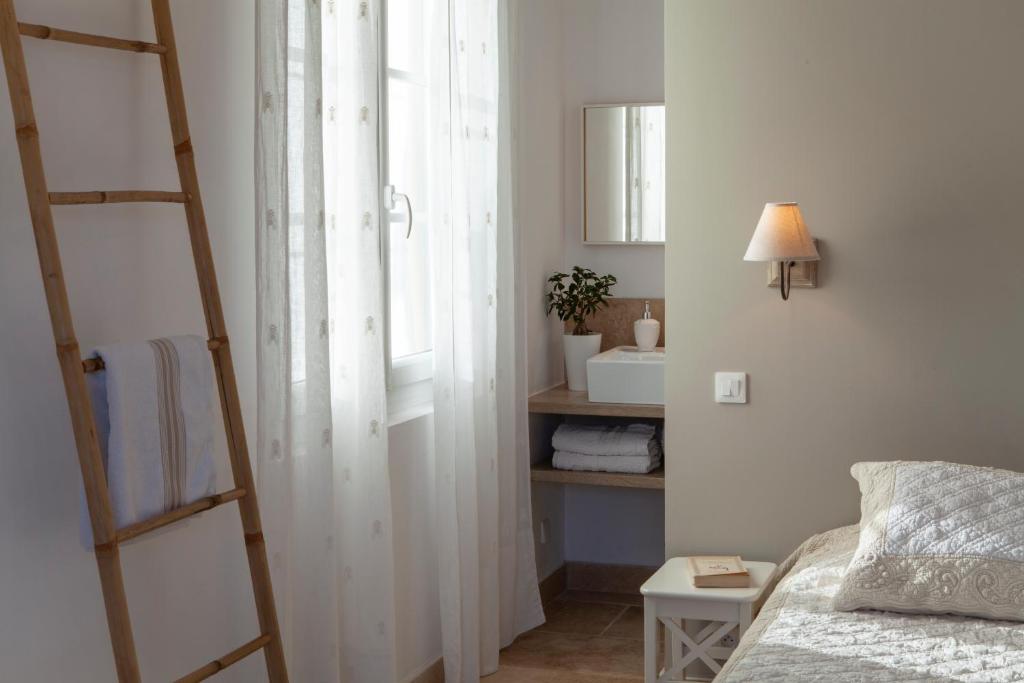 Postel nebo postele na pokoji v ubytování Chambre d'hôtes le Mirail