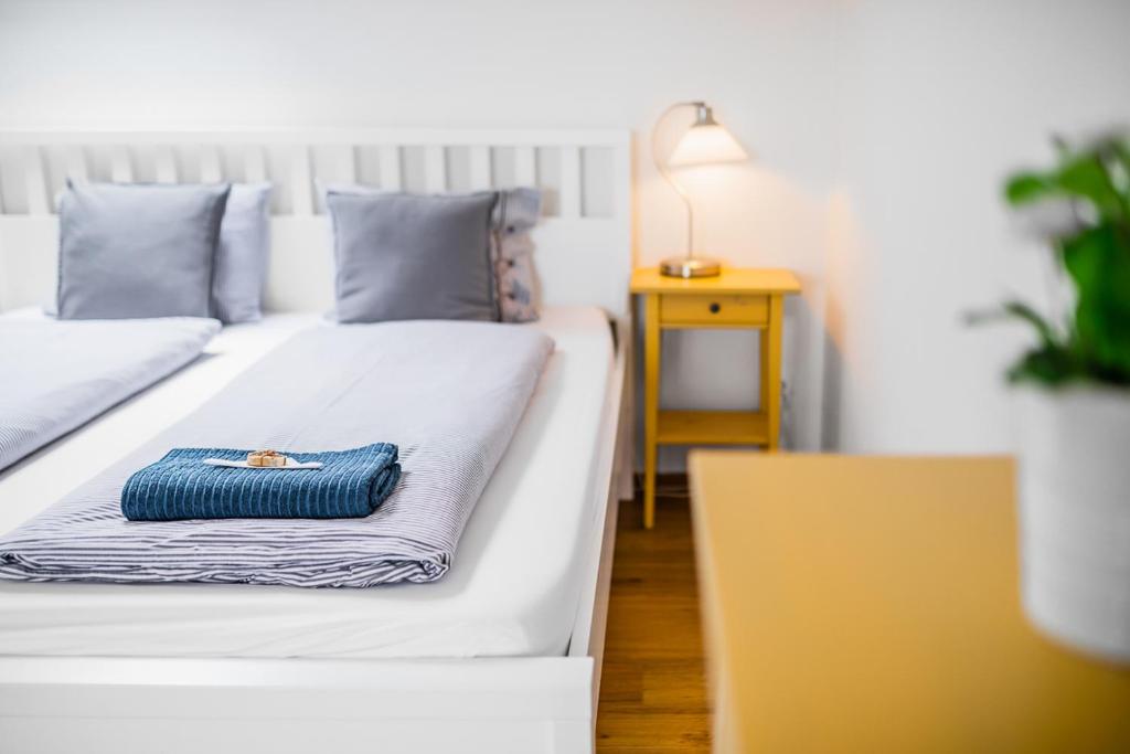 Postel nebo postele na pokoji v ubytování Apartmán Ema Dolní Dunajovice