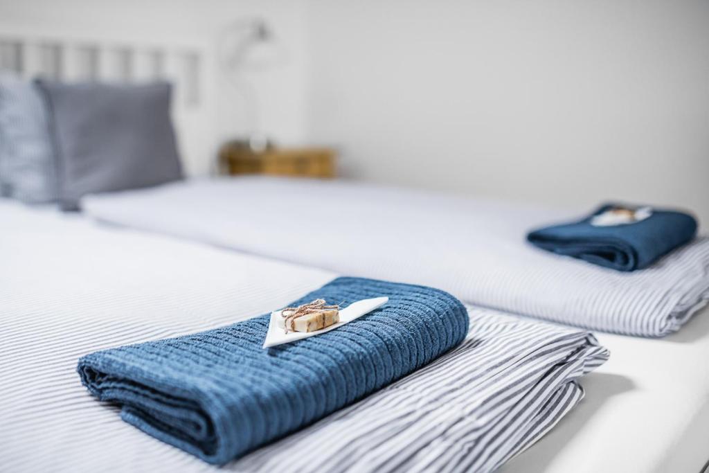 Postel nebo postele na pokoji v ubytování Apartmán Ema Dolní Dunajovice