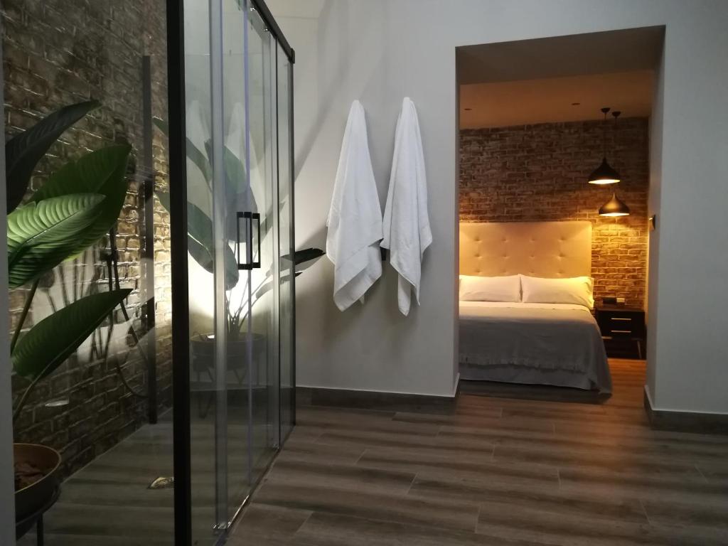 Posteľ alebo postele v izbe v ubytovaní Alvarado Loft Rural