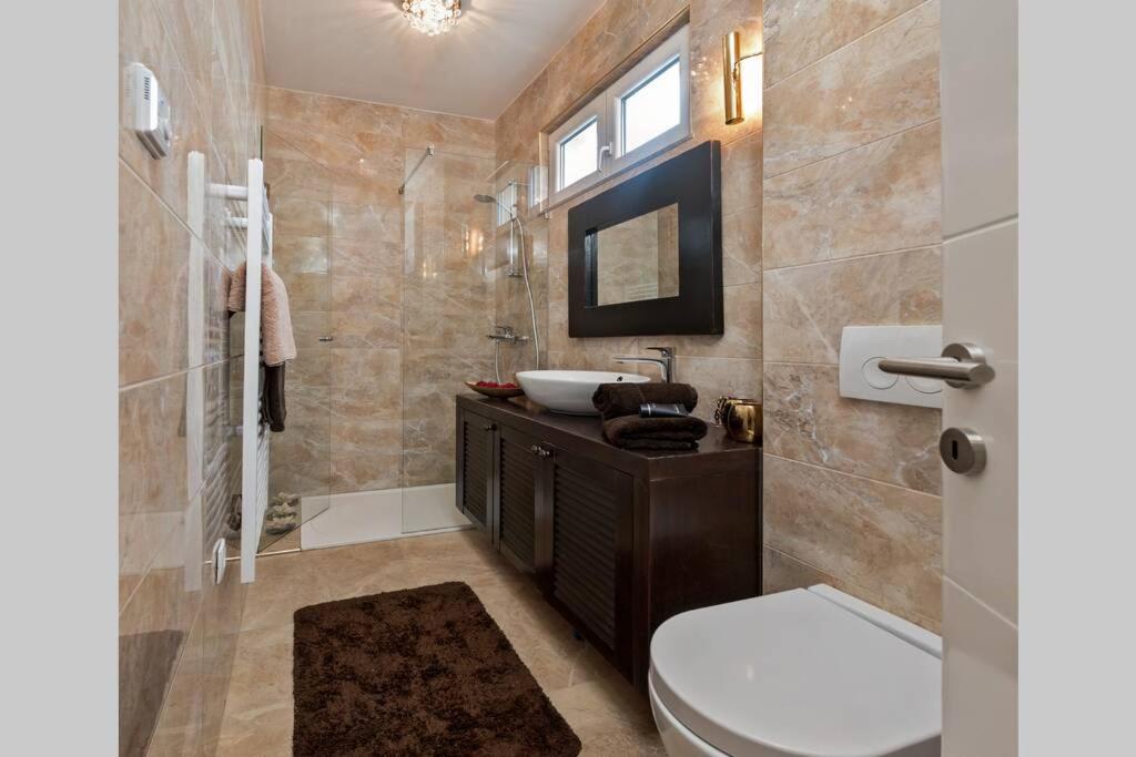 Kúpeľňa v ubytovaní Ensidia Luxury Suite