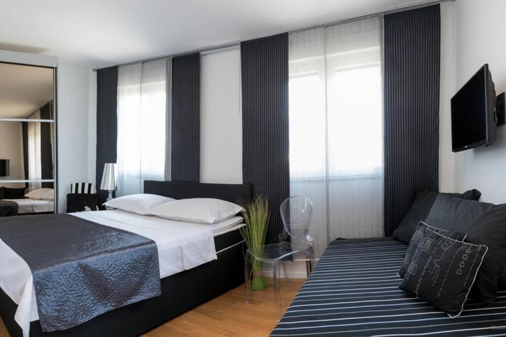Posteľ alebo postele v izbe v ubytovaní Ensidia Luxury Suite