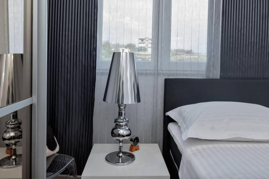 Posteľ alebo postele v izbe v ubytovaní Ensidia Luxury Suite