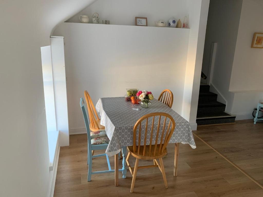 a dining room with a table and chairs at Room 2 Camp Street B&B & Self Catering in Oughterard