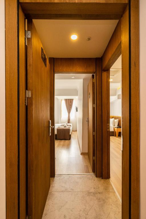 A bed or beds in a room at Castillo Rojo Hotel Istanbul
