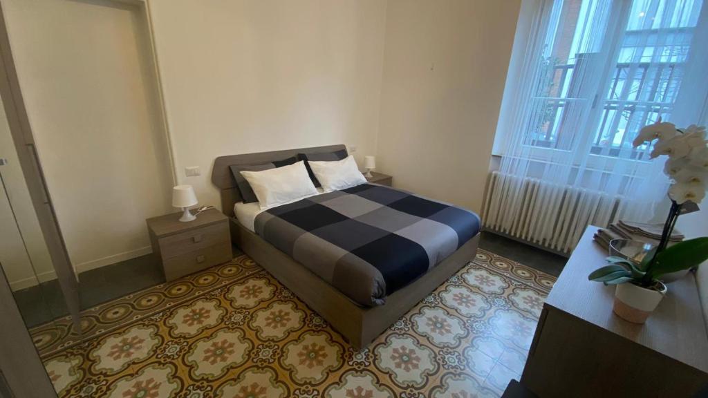 מיטה או מיטות בחדר ב-Angolo di isa
