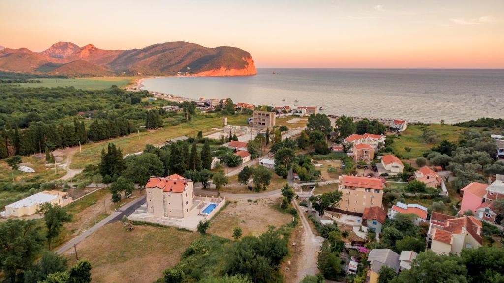 an aerial view of a small town next to the water at Luxury Apartments Queen in Petrovac na Moru