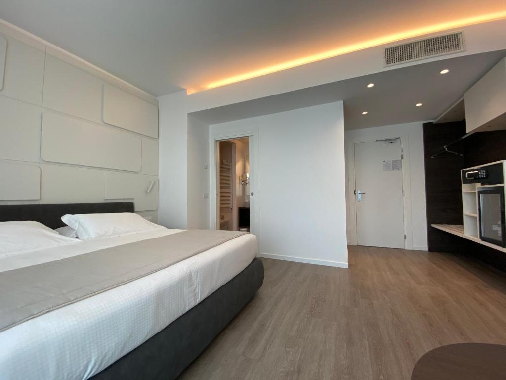 Postel nebo postele na pokoji v ubytování Solho Hotel