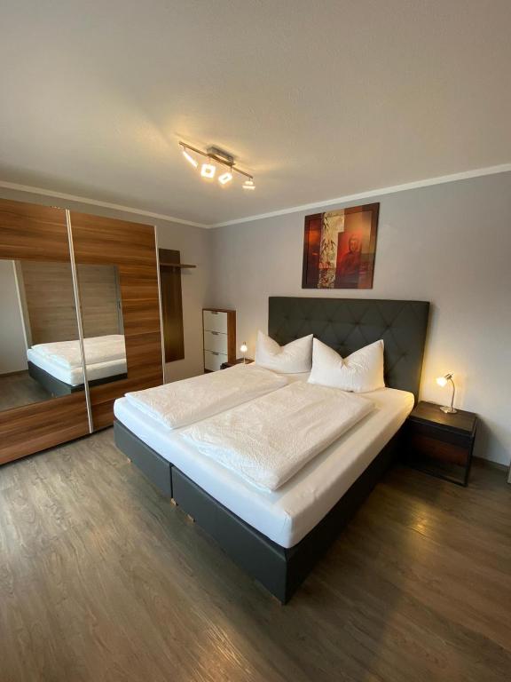 Postel nebo postele na pokoji v ubytování Appartements Rofangarten