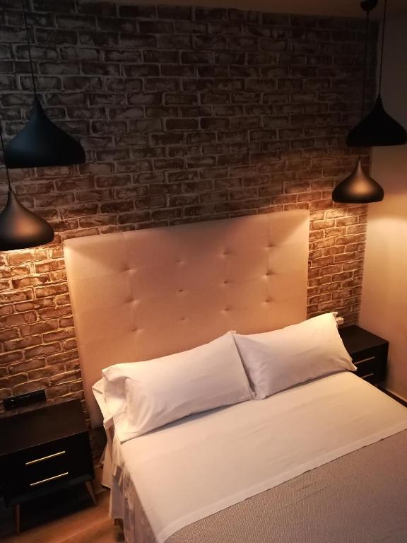 Posteľ alebo postele v izbe v ubytovaní Alvarado Loft Rural