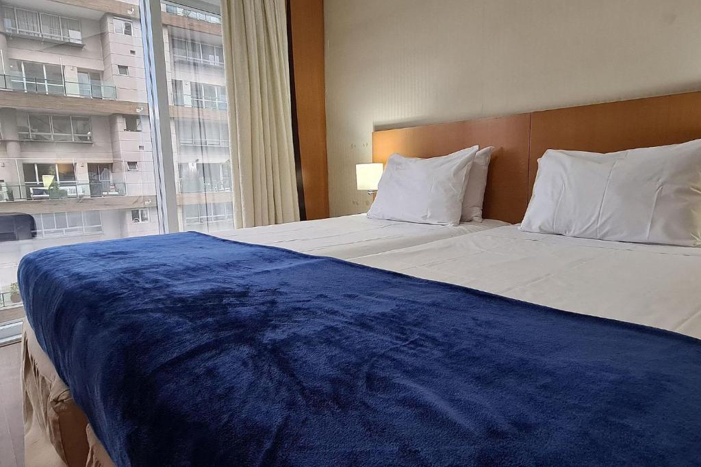 Cama o camas de una habitación a añoLife Comfort Ibirapuera 801