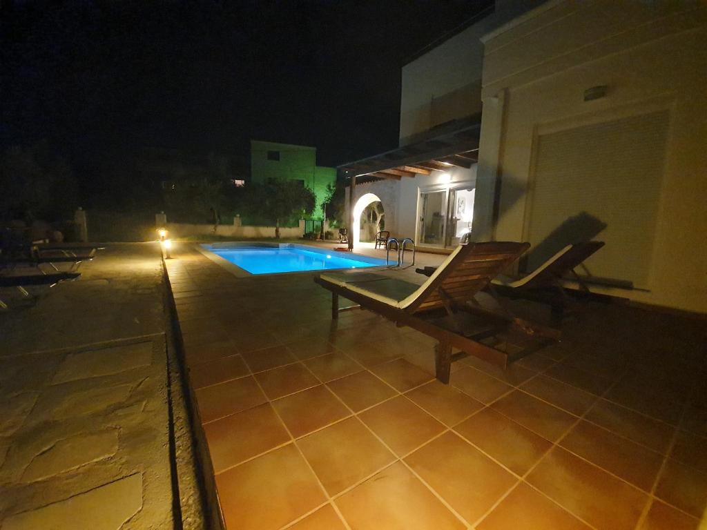 The swimming pool at or close to Argo Villa Kalives