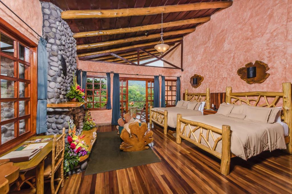 Postel nebo postele na pokoji v ubytování Peace Lodge