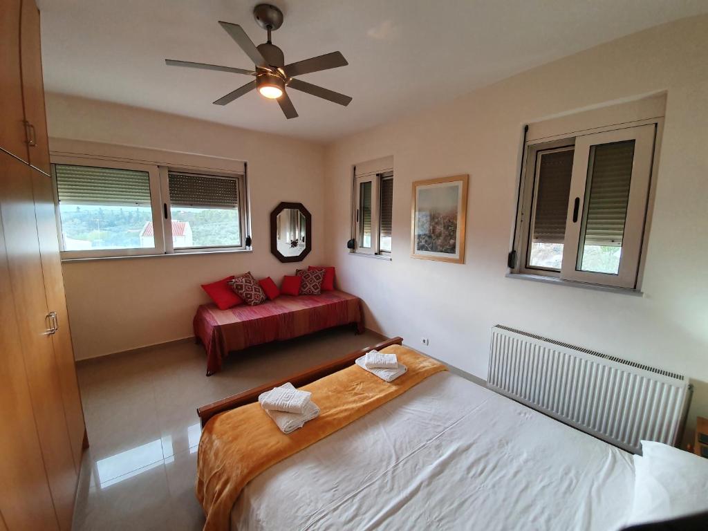 A bed or beds in a room at Argo Villa Kalives