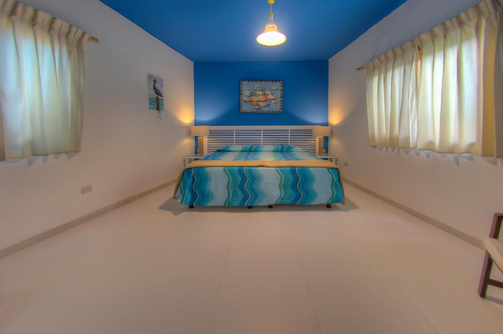 Postel nebo postele na pokoji v ubytování La Casa de Marita