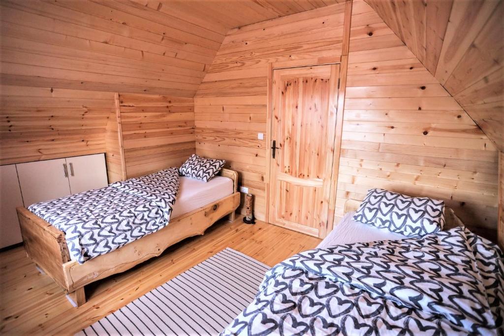 Postel nebo postele na pokoji v ubytování Zlatar Luxury Chalet - TRACE OF NATURE 2214