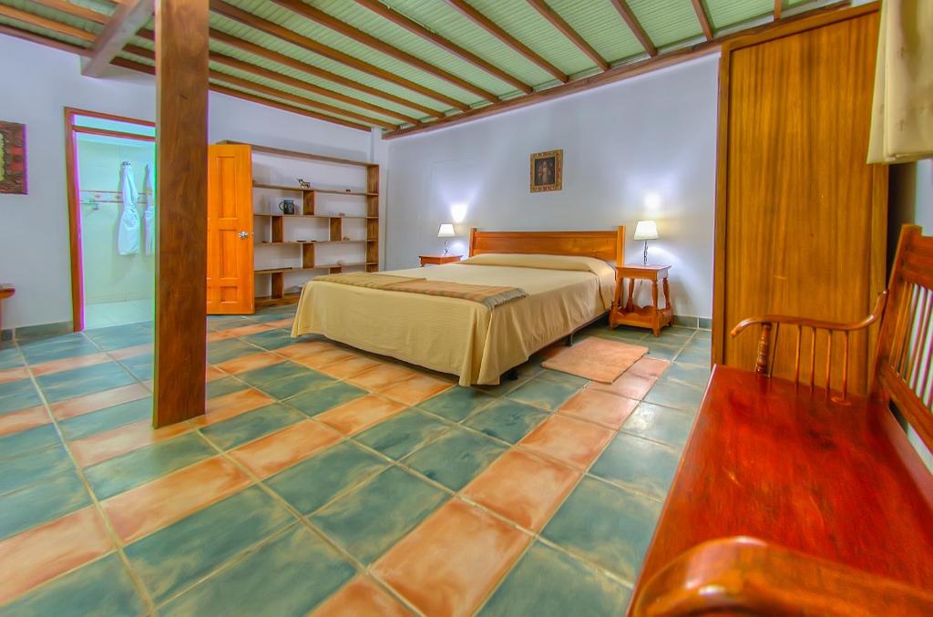 Postel nebo postele na pokoji v ubytování La Casa de Marita