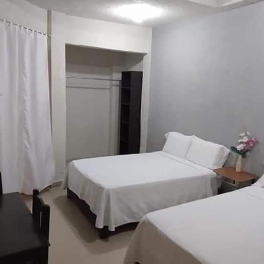 Cama o camas de una habitación en Reyees suite