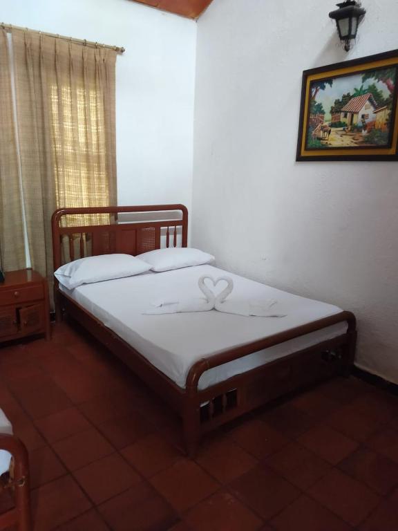 Postel nebo postele na pokoji v ubytování Villa San Nicolás