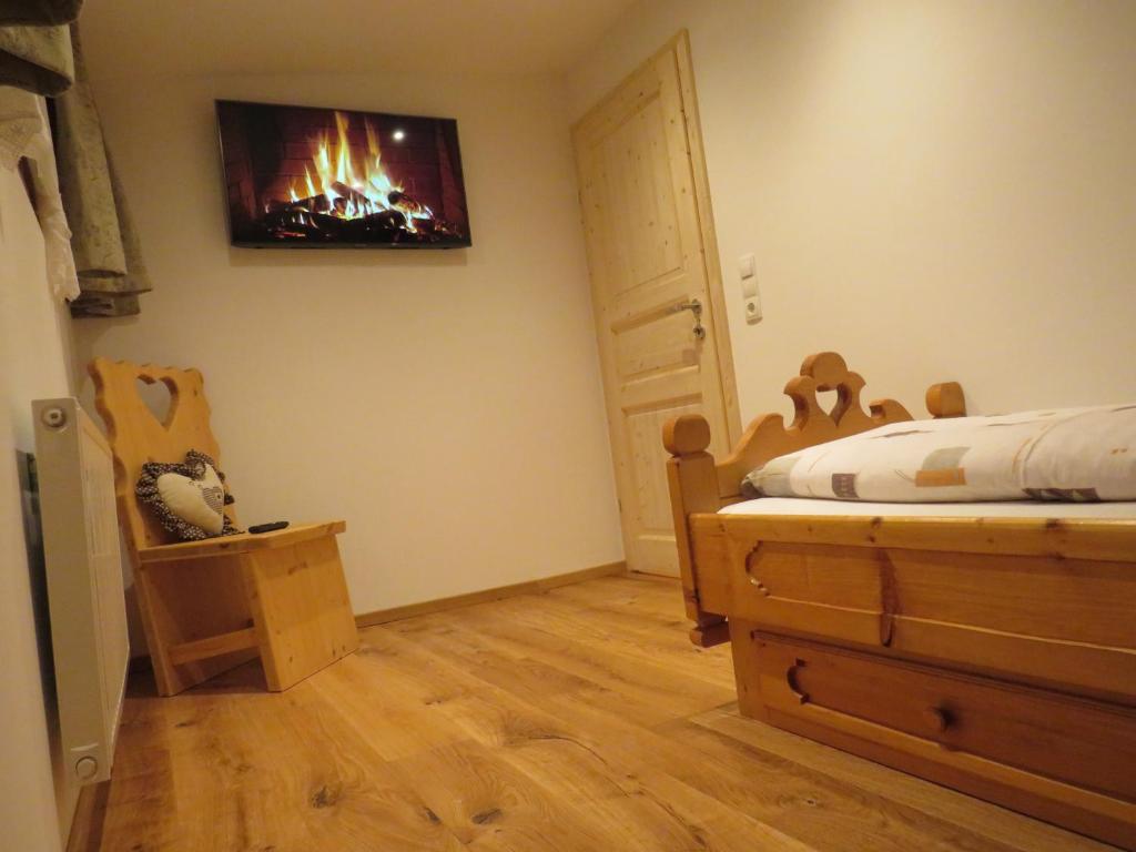 Postel nebo postele na pokoji v ubytování Haus Hubertus - Gästehaus Sahler