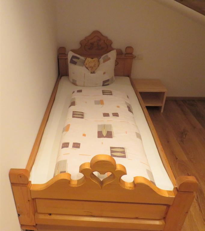 Postel nebo postele na pokoji v ubytování Haus Hubertus - Gästehaus Sahler