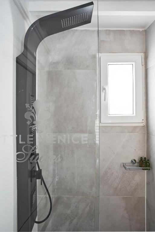 A bathroom at Little Venice Suites