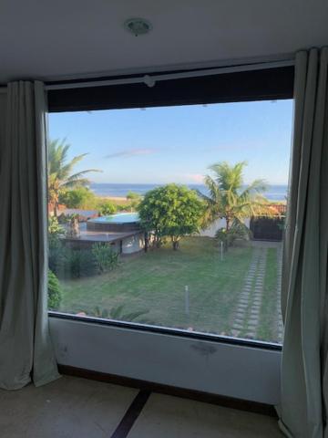  CASA EM FRENTE À PRAIA DE ITAÚNA