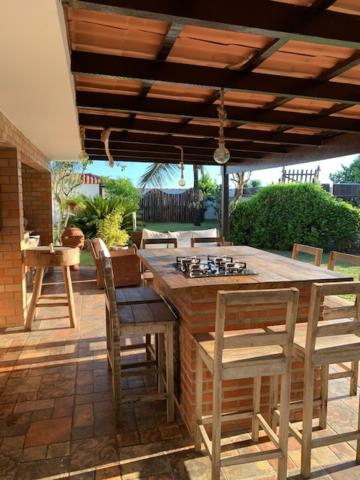  CASA EM FRENTE À PRAIA DE ITAÚNA
