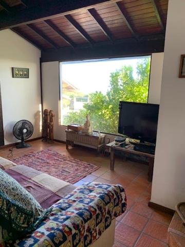  CASA EM FRENTE À PRAIA DE ITAÚNA