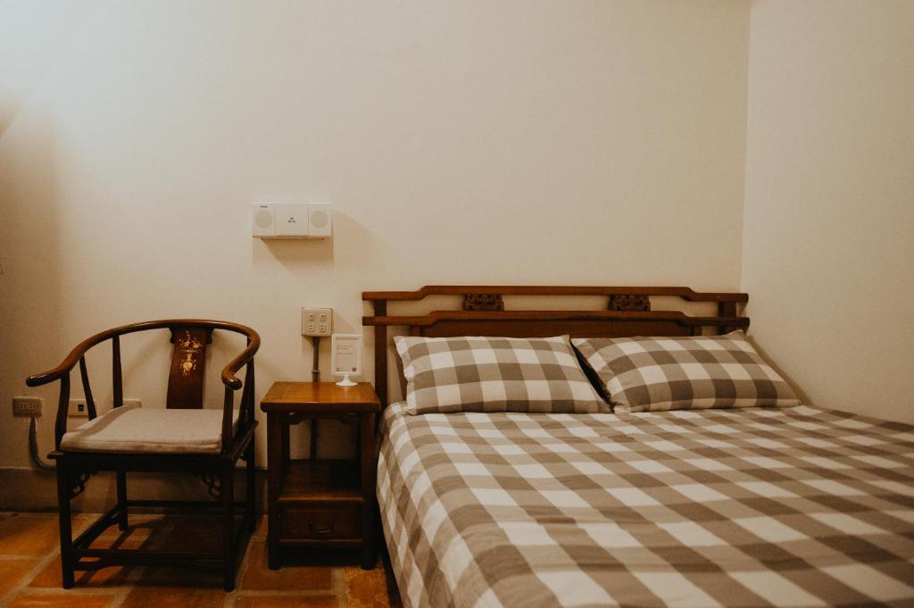 Postel nebo postele na pokoji v ubytování Live Guest House