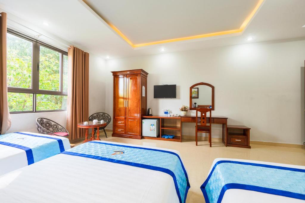 Quynh Mai Resortにあるテレビまたはエンターテインメントセンター