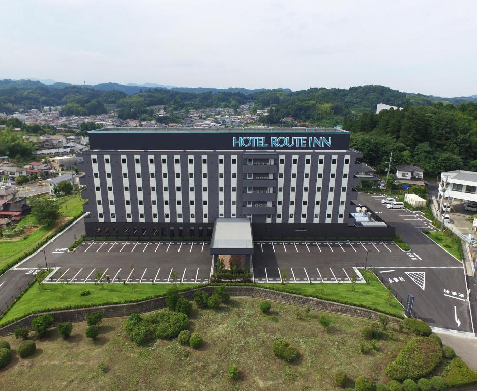 an aerial view of a hotelroth inn with a parking lot at Hotel Route-Inn Nihonmatsu in Nihommatsu