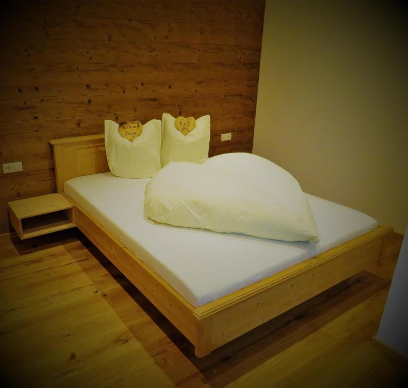 Postel nebo postele na pokoji v ubytování Haus Hubertus - Gästehaus Sahler