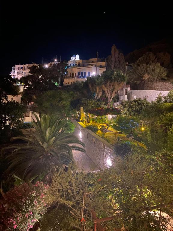 a view of a city at night at Anna Studios in Katapola