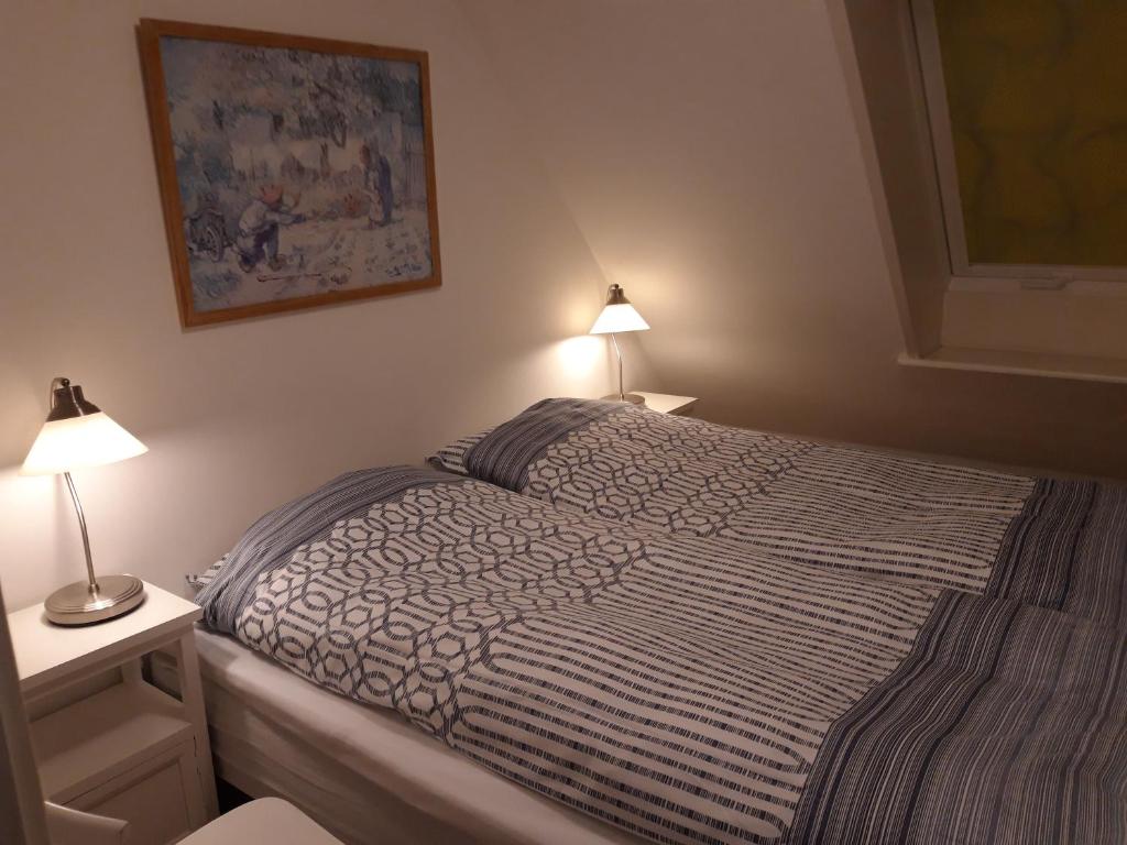 Postel nebo postele na pokoji v ubytování Skovboferie Apartments BB