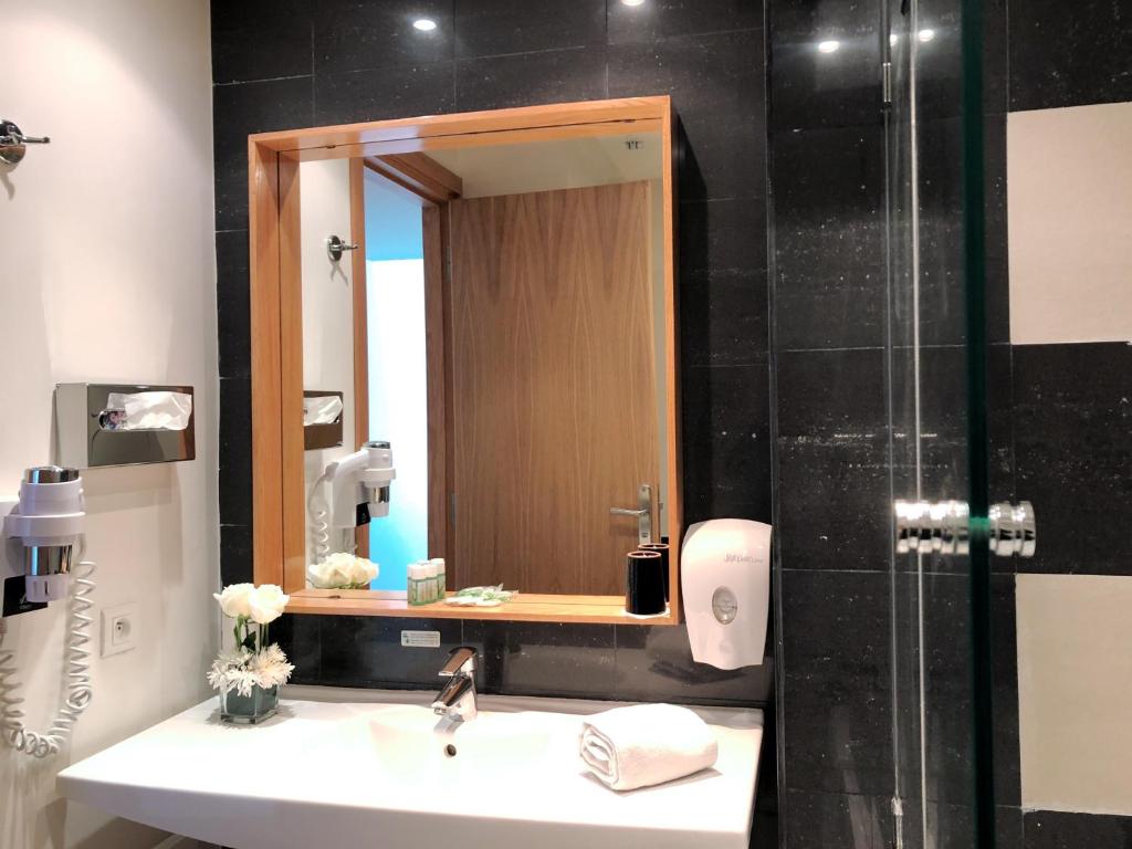 Koupelna v ubytování Le Pietri Urban Hotel
