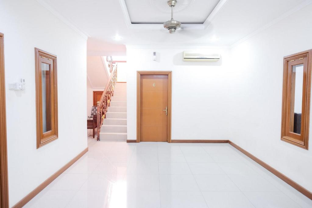 Fotografie z fotogalerie ubytování wisma delapan Mitra RedDoorz v destinaci Jakarta