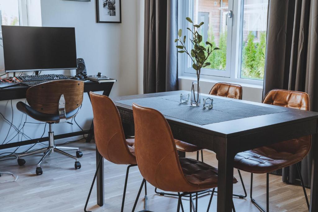 TV a/nebo společenská místnost v ubytování Magnolia House Norrviken
