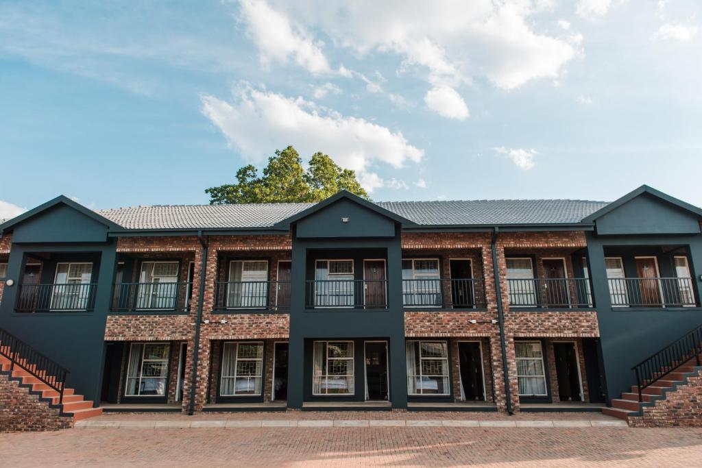 an exterior view of a building at Melrose Place Guestrooms in Potchefstroom