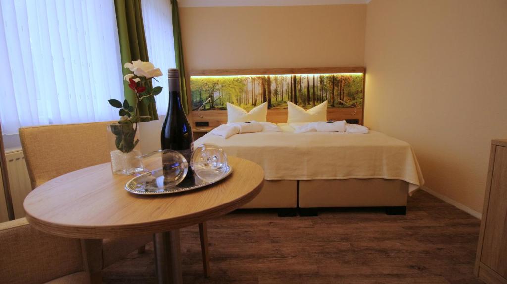 Postel nebo postele na pokoji v ubytování Hotel Harzresidenz