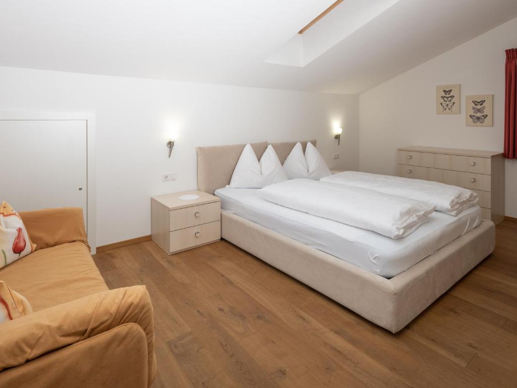 Postel nebo postele na pokoji v ubytování Residence Iris